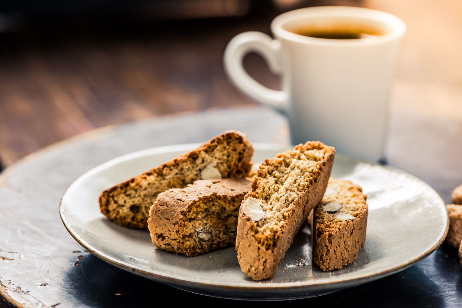 Strong coffee served with italian almond cookies cantucci